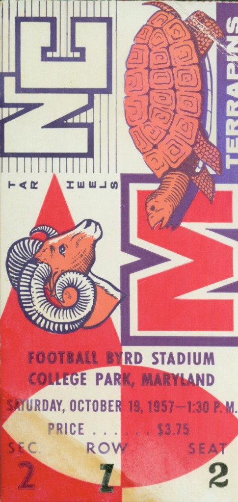 Red, white, and purple ticket stub to the game. 
