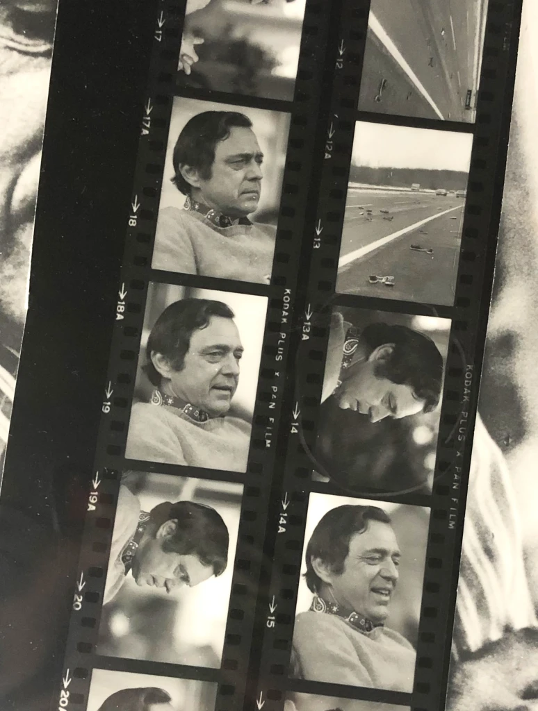 Black and white photo of two film strips of Whittemore as he is teaching a class. He is looking off to the side and speaking in some of the photos. 